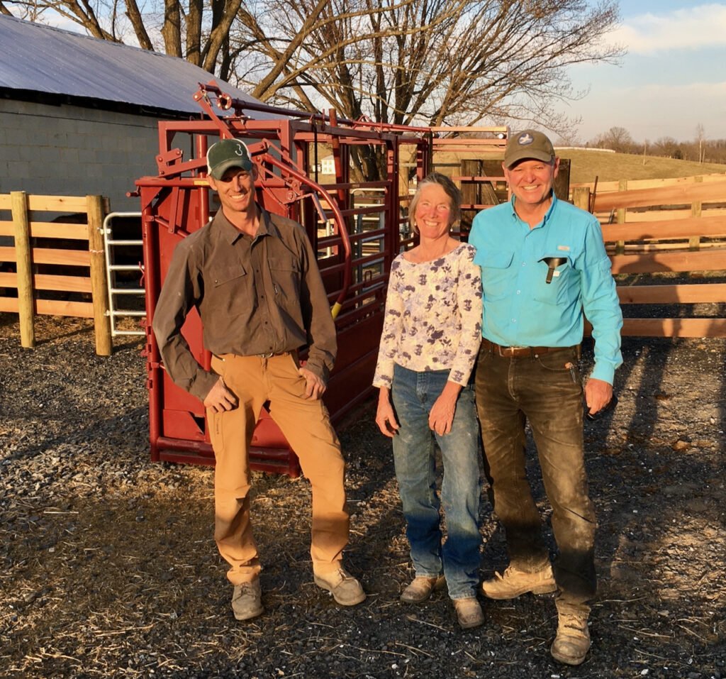 Jake Wilson joins Jeanne and Bobby at the completion of the fencing projects at Whiskey Creek Angus.
